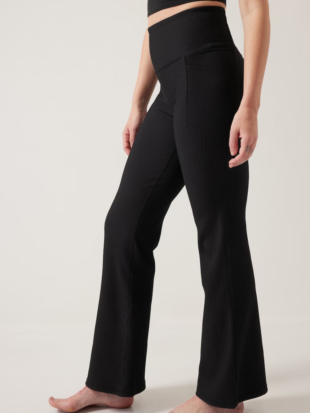 Athleta Salutation Stash Rib Flare black legging pants size L NWT
